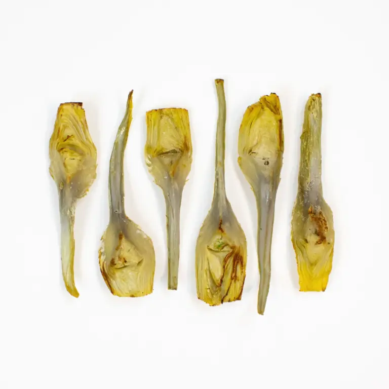 A picture of Artichoke Hand-Cut Quarters w/ Stems, Ckd