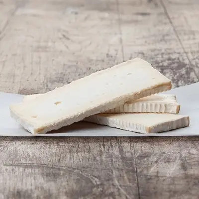 A picture of Brie slices IQF