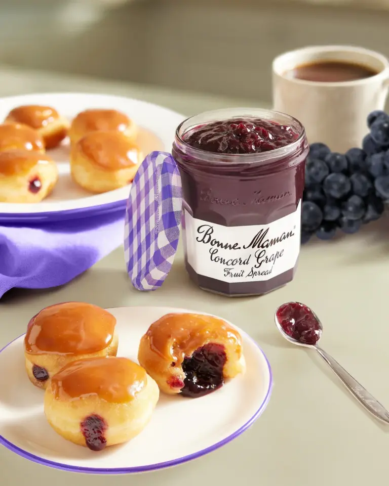 A picture of Peanut Butter Glazed Concord Grape Donut Holes